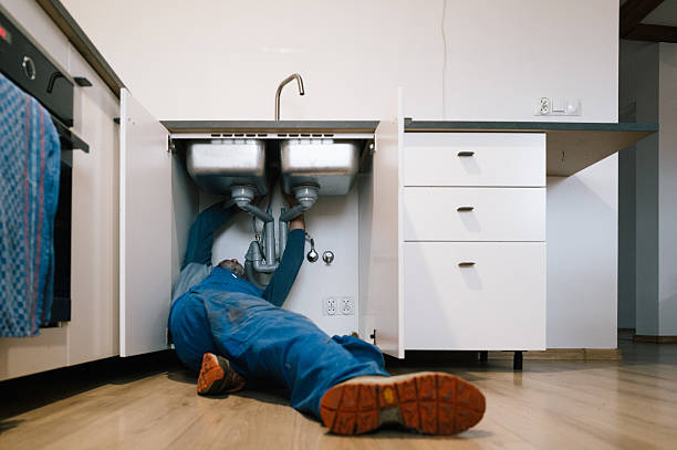 Professional Drain Cleaning technician working in Carle Place, NY